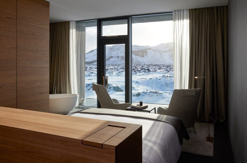 luxury_bedroom_with_view_of_snowy_vista_iceland