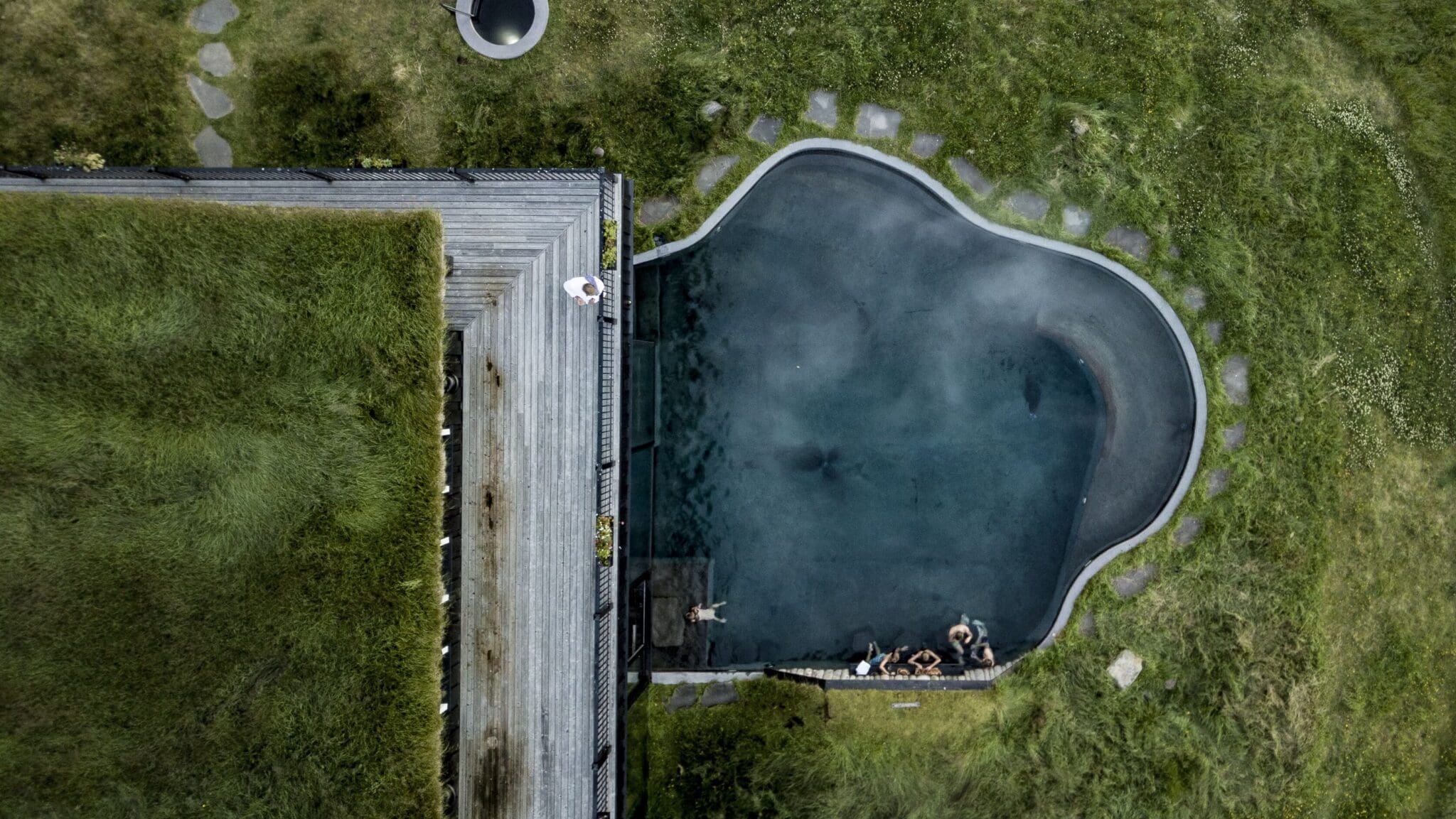 deplar_farm_satellite_view_with_green_fields_and_lake