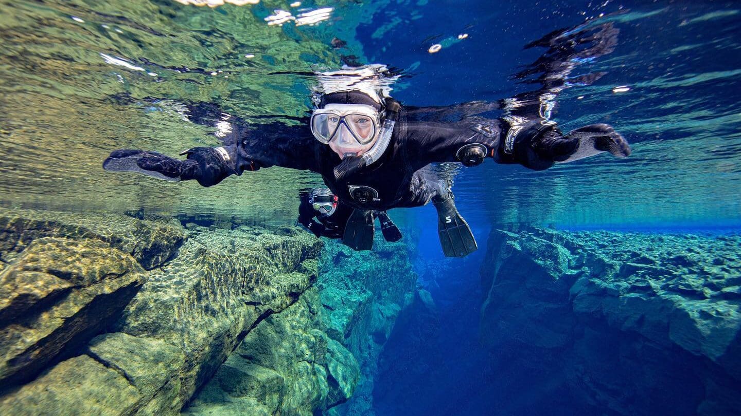 person_snorkeling_iceland-clear_water