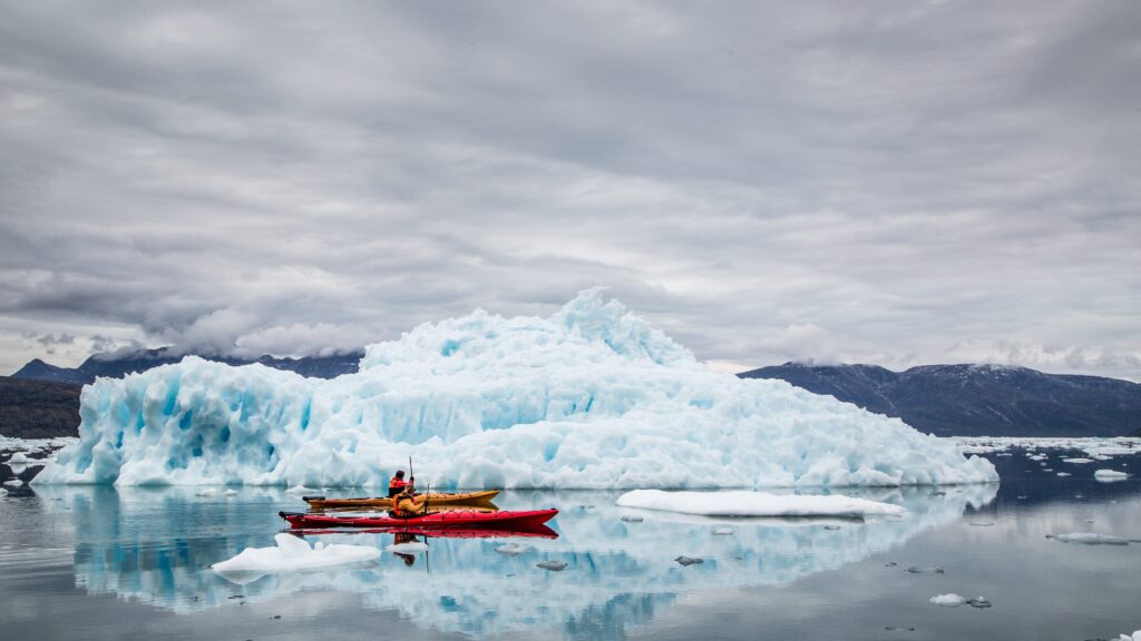 two_kayaks_amidst_glaciers